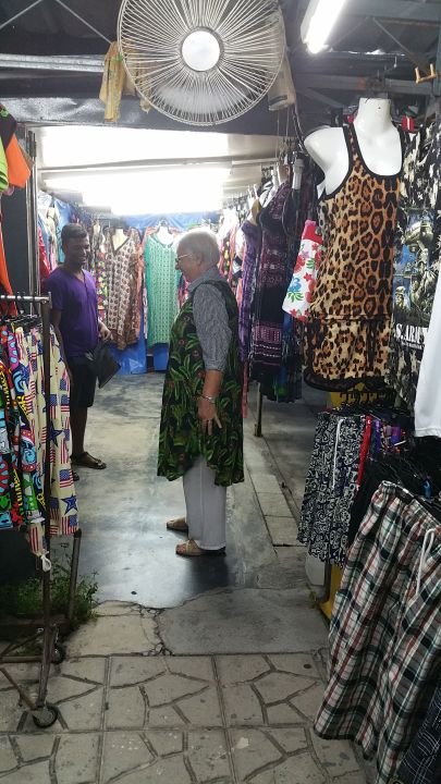 Julie at the BF night markets trying out her expensive buy.